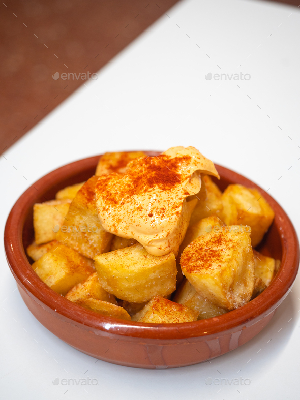 Clay Pot With Patatas Bravas, A Traditional Spanish Tapa. Fried ...